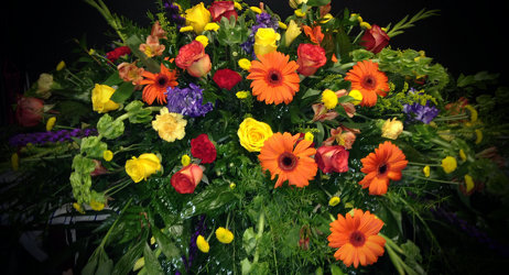 "Summer's Sun" sympathy spray from Faught's Flowers & Gifts, florist in Jonesboro