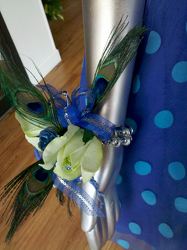 pretty blue peacock corsage from Faught's Flowers & Gifts, florist in Jonesboro